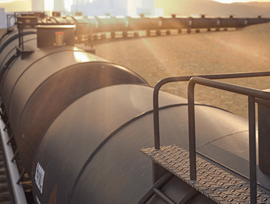 Railcar in front of a sunset